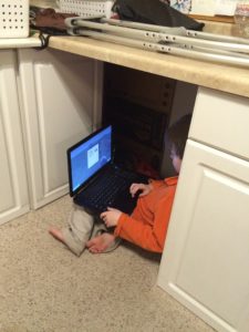 Sometimes...under the counter is the best place to play Minecraft.